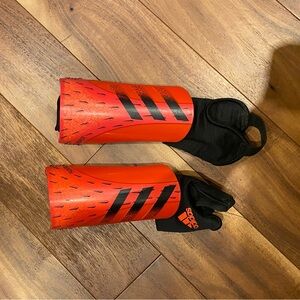 Adidas soccer shin pads black and red